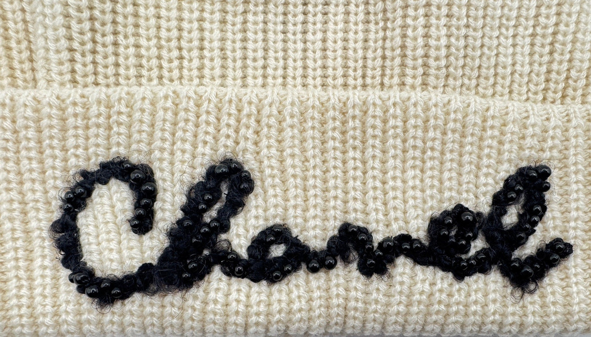 Chanel White Beanie with Black Pearls Logo