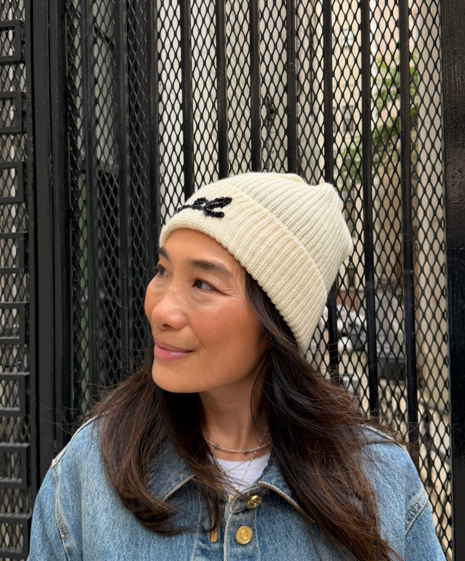 Chanel White Beanie with Black Pearls Logo